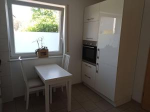 Kuchyň nebo kuchyňský kout v ubytování Wohnung für 4 Personen