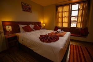 Postel nebo postele na pokoji v ubytování Hotel Encanto de San Blas