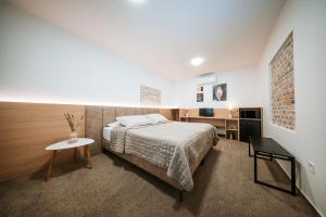 Postel nebo postele na pokoji v ubytování Apartmány Reduta - new