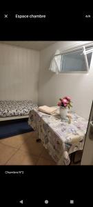 Giường trong phòng chung tại Basel Saint-Louis Les 3 Frontières