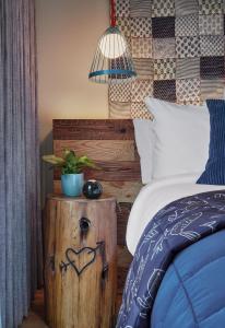 Giường trong phòng chung tại Treehouse Hotel Silicon Valley