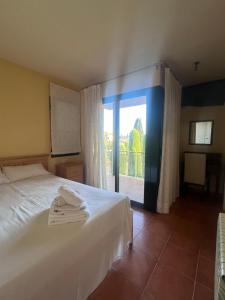 Posteľ alebo postele v izbe v ubytovaní Villa Torremirona Resort Palmeras