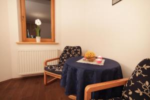 Posedenie v ubytovaní ApartSerwis - Apartment U Sabały Centrum