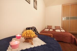 Posteľ alebo postele v izbe v ubytovaní ApartSerwis - Apartment U Sabały Centrum
