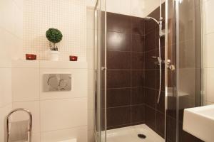 Kúpeľňa v ubytovaní ApartSerwis - Apartment U Sabały Centrum