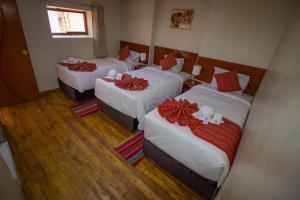Postel nebo postele na pokoji v ubytování Hotel Encanto de San Blas + 11 fotografií
