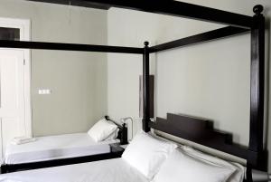 Letto o letti in una camera di Casa Colonial