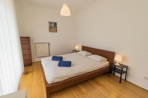 Ένα ή περισσότερα κρεβάτια σε δωμάτιο στο Villa Penedo
