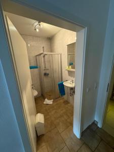 Phòng tắm tại Zimmervermietung Heggemann +16 ảnh