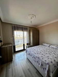Postel nebo postele na pokoji v ubytování Denize Yakın Müstakil Tripleks Villa