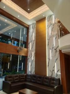 Posezení v ubytování Grand Courtyard Business Hotel