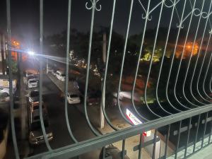 a view of a busy city street at night at Habitación económica in Santiago de los Caballeros