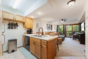 a kitchen with a sink and a counter top at NE16-2 Sleepy Bear Camp condo in Branson West