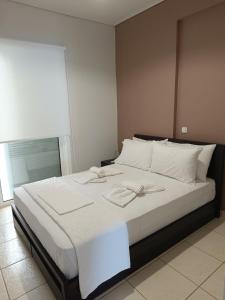 Postel nebo postele na pokoji v ubytování Casa Vista - Gythio Apartments