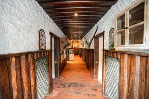 an empty hallway of a house with wooden walls at Schallerhof in Neustift im Stubaital