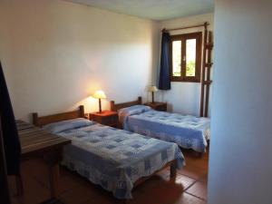 Postel nebo postele na pokoji v ubytování La Posada