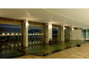 a lobby of a building with a swimming pool at Tokigasane - Vacation STAY 15860v in Kaga
