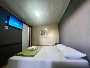 Espaço Verano - Suítes客房内的一张或多张床位