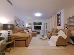 Televízia a/alebo spoločenská miestnosť v ubytovaní Apartamento Romero valencia
