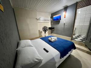 Espaço Verano - Suítes客房内的一张或多张床位