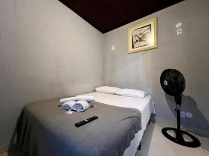 Espaço Verano - Suítes客房内的一张或多张床位