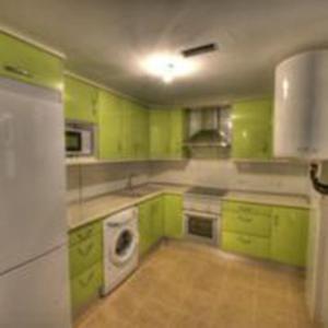 Kuchyň nebo kuchyňský kout v ubytování Apartamento 4p