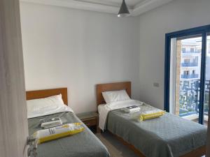 Postel nebo postele na pokoji v ubytování MARTIL COSTA MAR Appartement de Luxe + 21 fotografií