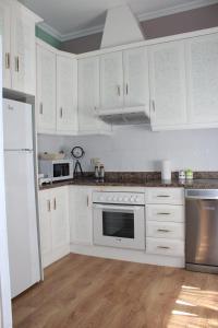 Kuchyň nebo kuchyňský kout v ubytování vivienda de uso Turístico El Jabalon