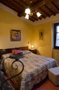 Postel nebo postele na pokoji v ubytování Locazione turistica ex Le Casette Di Cedromonte