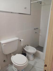 Un baño de Lomas del Uritorco - Casa de Alq x Temp