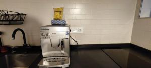 a coffee maker sitting on a counter in a kitchen at Mundaka Old town in Mundaka