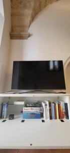 A television and/or entertainment centre at Giulia's House