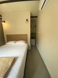 Postelja oz. postelje v sobi nastanitve Posada San Miguel