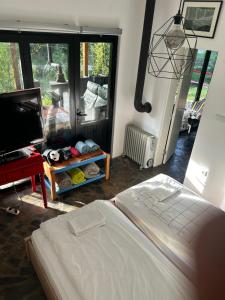 Postel nebo postele na pokoji v ubytování Jarmenovci glamping resort