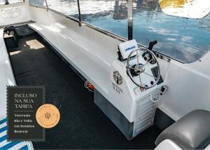 a boat with a speedometer on the side of it at Pousada Astral da Ilha in Ilha do Mel