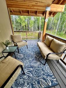 Posezení v ubytování Reed Lake Northstar Cabins + 28 fotografií