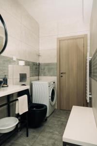 Postel nebo postele na pokoji v ubytování Rest Apartments