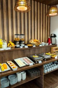 a buffet of food on display in a restaurant at Antawa Hotel in Moquegua