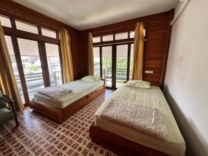 Postel nebo postele na pokoji v ubytování Krapow House