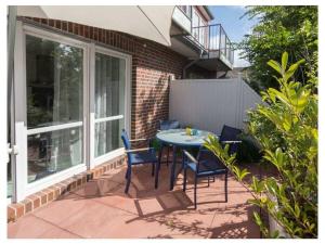 En balkon eller terrasse på Holiday apartment Zeppelinstek