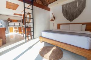 Postel nebo postele na pokoji v ubytování Hotel CasaBakal - A pie de Laguna - Bacalar