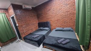 Posezení v ubytování RumaMataAyer Homestay Islam Semabok Perdana - Melaka