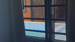 Bazén v ubytování RumaMataAyer Homestay Islam Semabok Perdana - Melaka nebo v jeho okolí