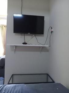 Μια τηλεόραση ή/και κέντρο ψυχαγωγίας στο House Of Elea SYARIAH +10 φωτογραφίες