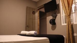 Hotel Simón Plaza房間的床