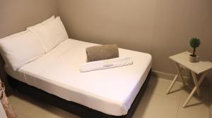 Hotel Simón Plaza房間的床
