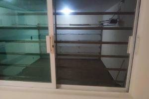 a glass door in a room with a window at Comodidad y Confort en Morelia in Morelia +1 photo