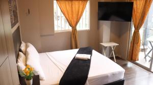 Hotel Simón Plaza房間的床