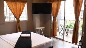 Hotel Simón Plaza房間的床