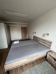 Postel nebo postele na pokoji v ubytování 3kk - centrum Havířova